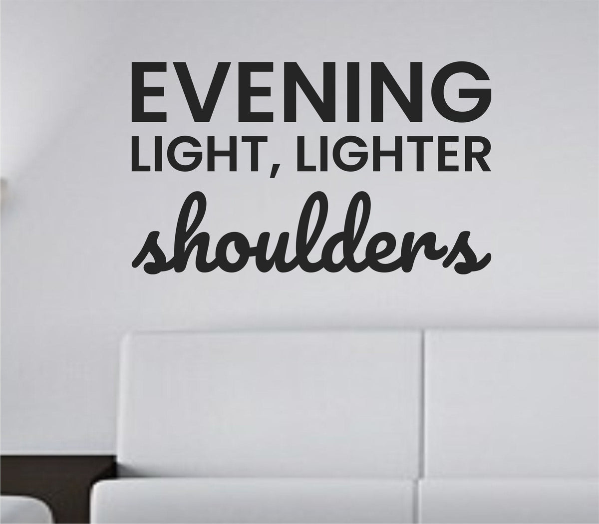Black vinyl wall decal with the quote 'Evening light, lighter shoulders.' in simple, clean typography on a white background.