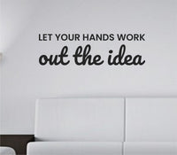 Black vinyl wall decal with the quote Let your hands work out the idea in a flowing script font on a white background