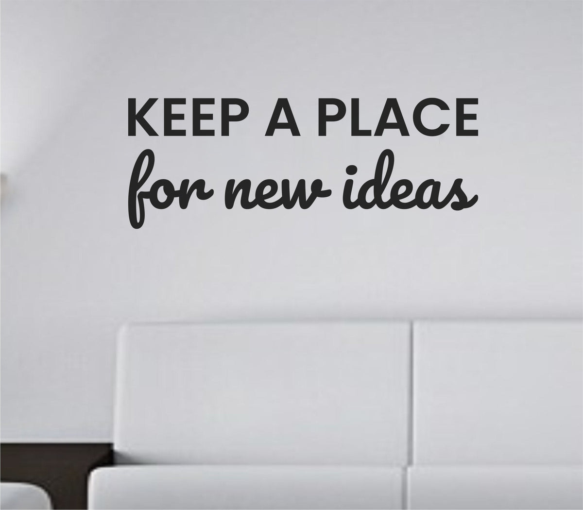Black text vinyl wall decal with the motivational quote 'Keep a place for new ideas' in a clean, modern font on a white background.