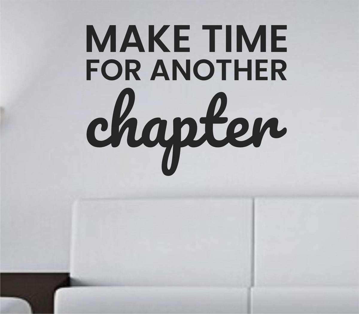 Black vinyl wall decal with the phrase “Make time for another chapter.” in a modern script font on a white background.