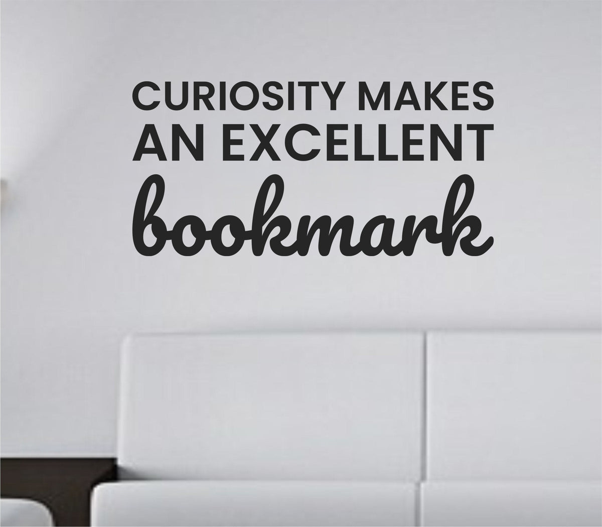 Black vinyl wall decal with the quote 'Curiosity makes an excellent bookmark' in a clean, modern font on a white background.