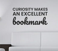 Black vinyl wall decal with the quote 'Curiosity makes an excellent bookmark' in a clean, modern font on a white background.