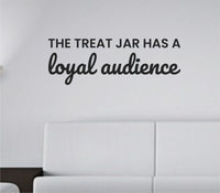 Black vinyl wall decal with the quote 'The treat jar has a loyal audience' in playful font on white background