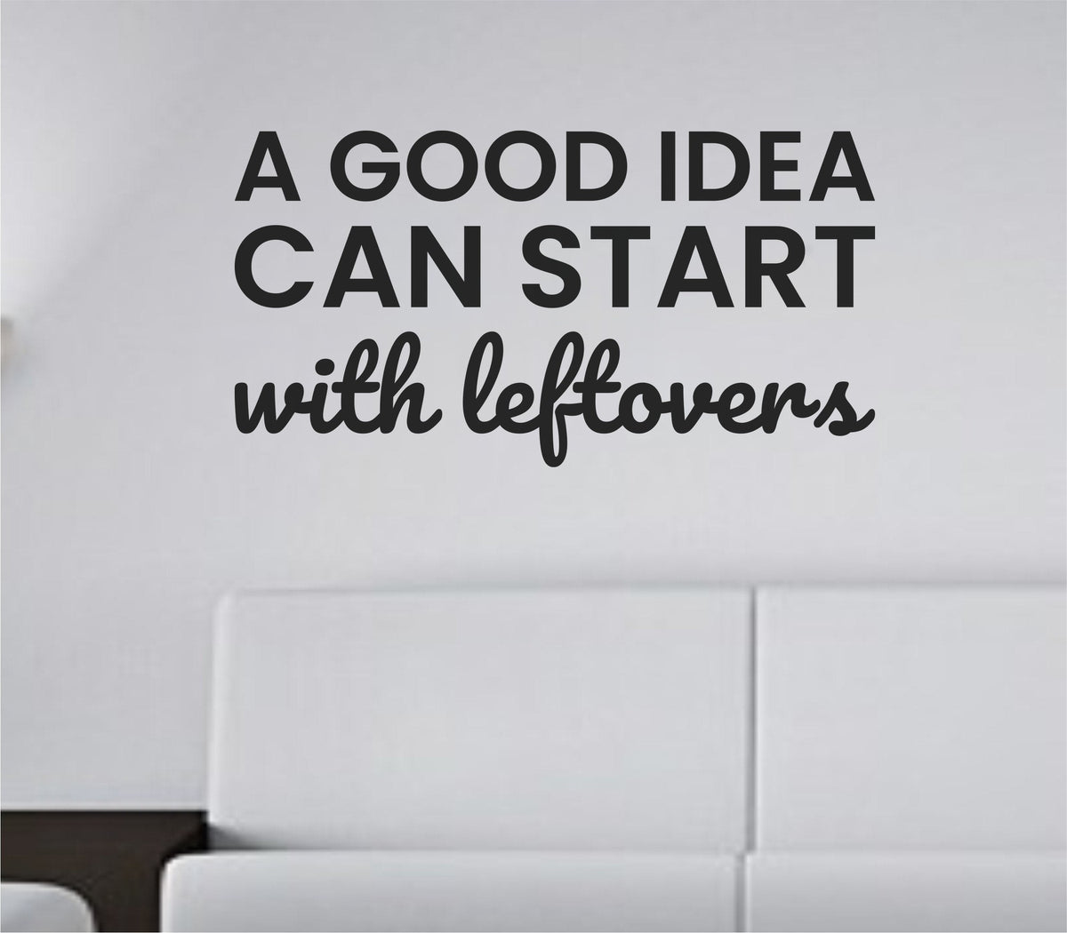 Black vinyl wall decal with the quote 'A good idea can start with leftovers' in a clean, modern font on a white background.