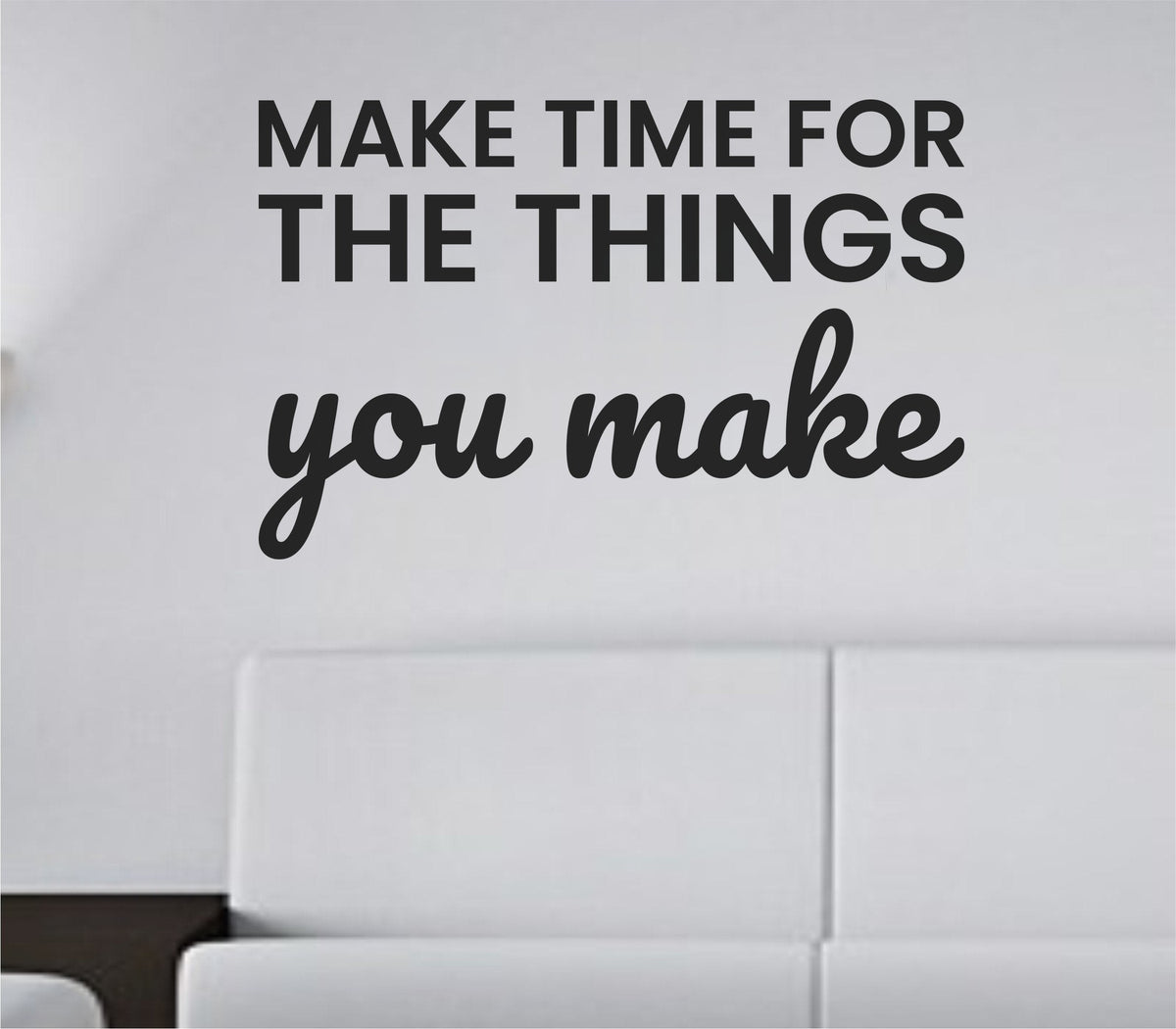Black vinyl wall decal with the motivational quote 'Make time for the things you make' in a clean modern font on a white background.