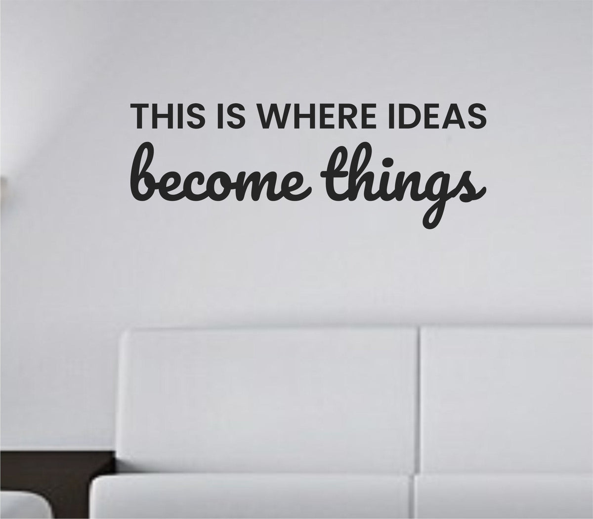 Black vinyl wall decal with the quote 'This is where ideas become things.' in bold lettering on a plain white background.