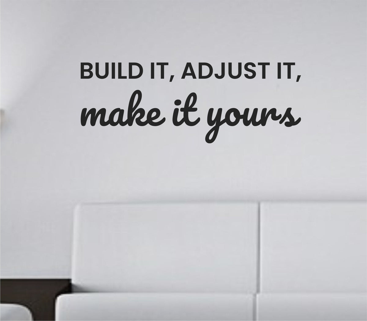 Black vinyl wall decal with the phrase 'Build it, adjust it, make it yours.' in clean simple lettering on white background.
