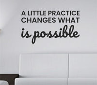 Black one-color vinyl wall decal with the quote A little practice changes what is possible in bold, simple font on a white background