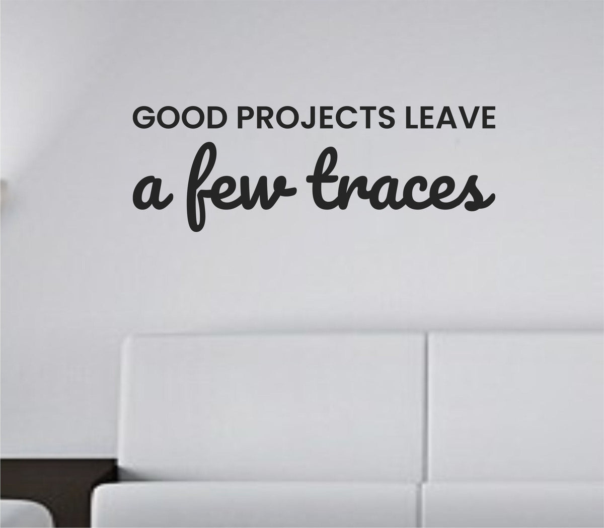 Black vinyl wall decal with the quote 'Good projects leave a few traces.' in simple, clean font on a white background