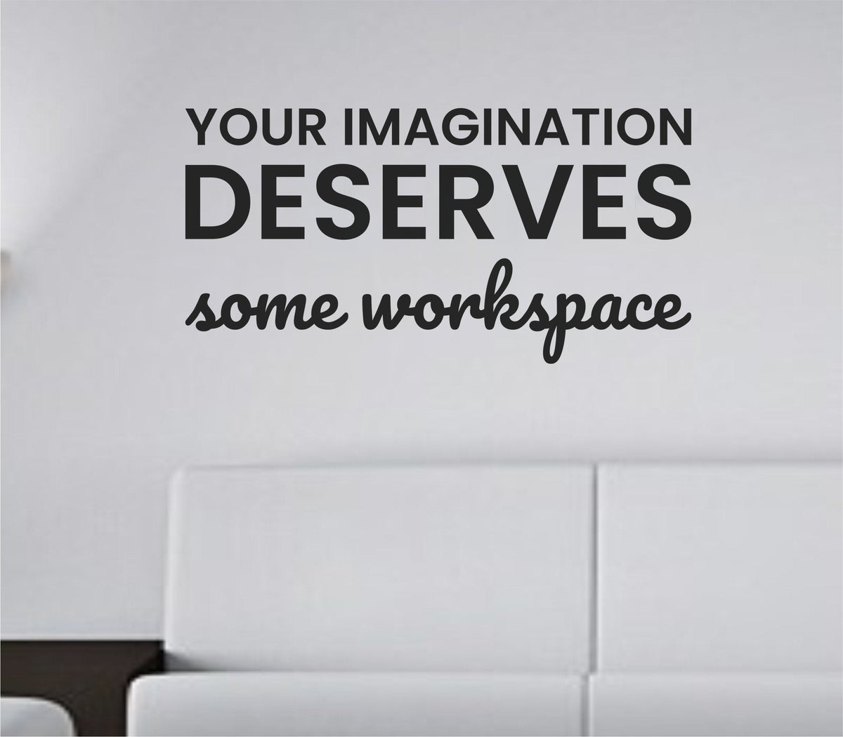 Black one-color vinyl wall decal with the phrase Your imagination deserves some workspace in a clean modern font on a white background