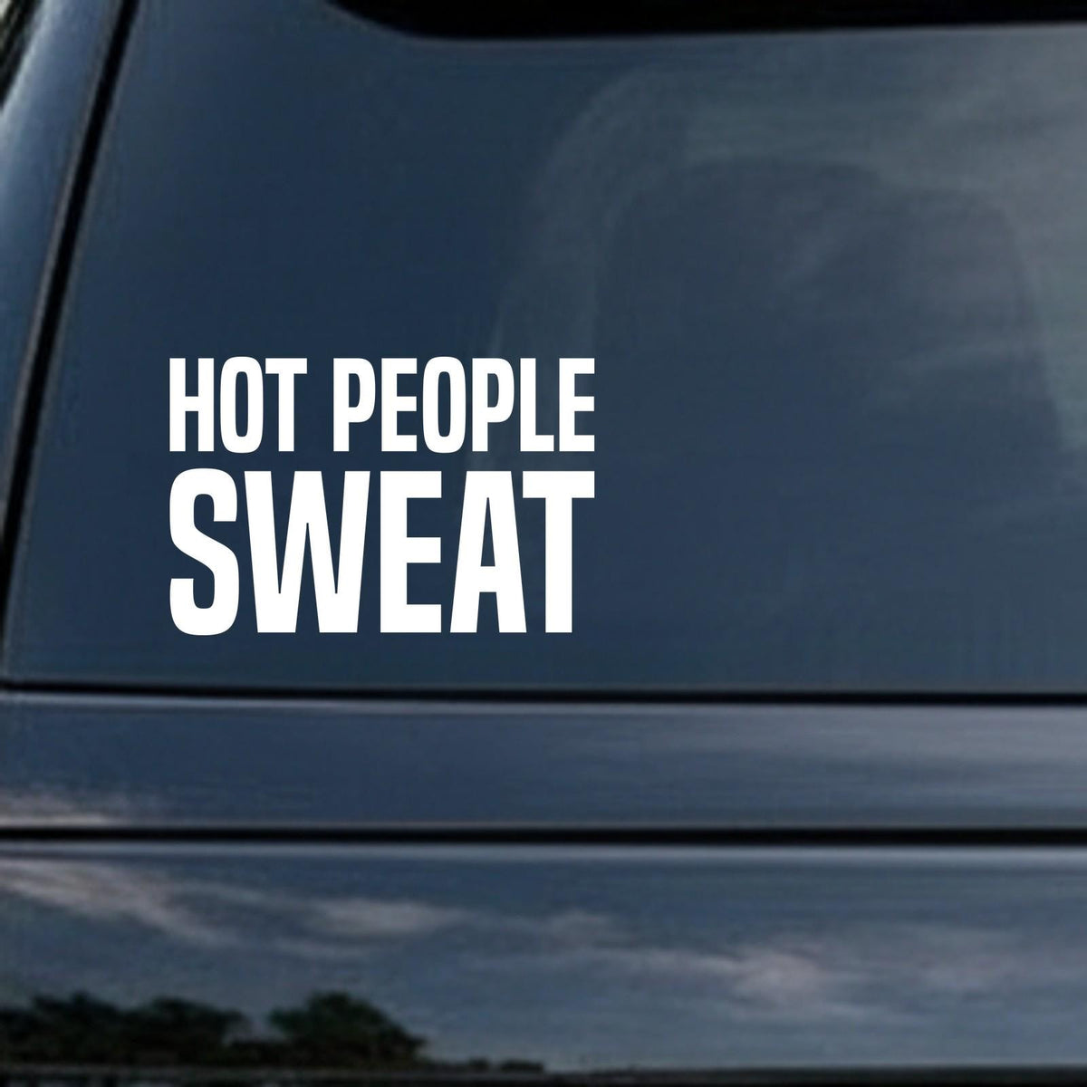 Hot People Sweat car decal in the small 6 inch size, shown in the corner of a rear window